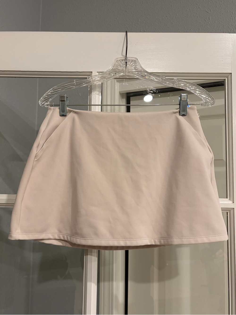girlfriend collective Cream White Mini Skort with Minimalist Branding Pockets